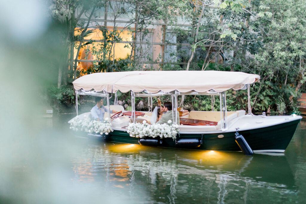 Wedding boat ride at Rosewood Mayakoba